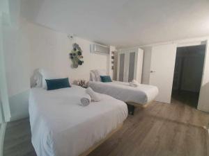 Posteľ alebo postele v izbe v ubytovaní ISG Apartments Feria 106