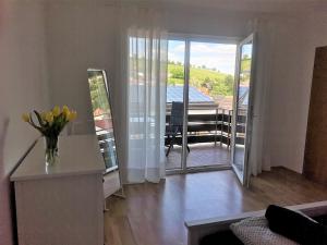 Posezení v ubytování Ferienwohnung Sonnenberg an der Weinstraße