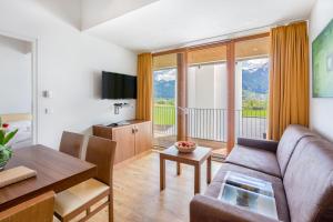 TV a/nebo společenská místnost v ubytování Emma Apartments-