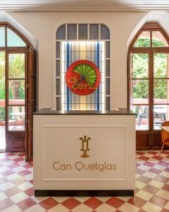 a church altar with a sign that says can queretickets at Hotel Can Quetglas in Palma de Mallorca