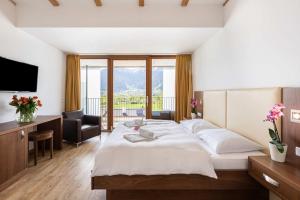 Postel nebo postele na pokoji v ubytování Emma Apartments-