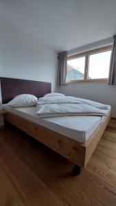 Katil atau katil-katil dalam bilik di Mittelbergerhof Ferienwohnungen