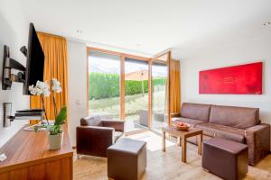 TV a/nebo společenská místnost v ubytování Emma Apartments-