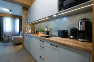 Kuchyňa alebo kuchynka v ubytovaní Apartament Forest Centrum