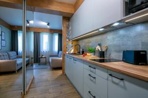 Kuchyňa alebo kuchynka v ubytovaní Apartament Forest Centrum