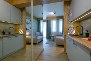 Kuchyňa alebo kuchynka v ubytovaní Apartament Forest Centrum