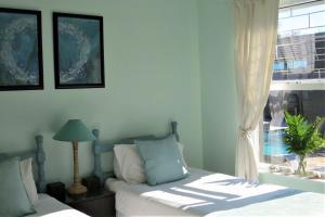 Ένα ή περισσότερα κρεβάτια σε δωμάτιο στο Anahata Self Catering +30 φωτογραφίες