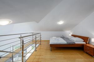 Postel nebo postele na pokoji v ubytování Adria Apartments