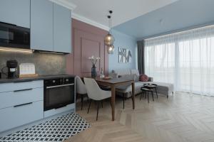 Kuchyňa alebo kuchynka v ubytovaní Apartamenty The View Hevenia