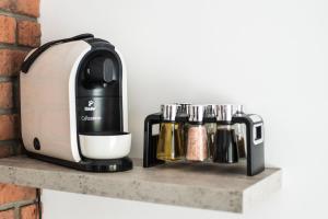 Príslušenstvo na prípravu kávy alebo čaju v ubytovaní Apartment City Centre Netflix- GreenPark - River