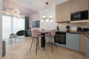 Kuchyňa alebo kuchynka v ubytovaní Apartamenty The View Hevenia