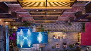 an overhead view of a pool in a building at Hotel Manang in Kathmandu