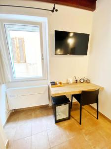 TV a/nebo společenská místnost v ubytování Avenida 12 + 33 fotografií