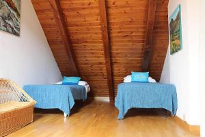 Cama o camas de una habitación en Lovely triplex apartment in La vall de Boi