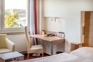 Postel nebo postele na pokoji v ubytování Diehls Hotel