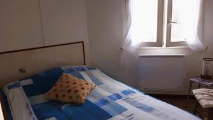 Postel nebo postele na pokoji v ubytování La Cotinière 5 personnes