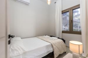 Postel nebo postele na pokoji v ubytování Villa Magdalena