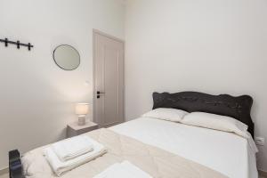 Postel nebo postele na pokoji v ubytování Villa Magdalena