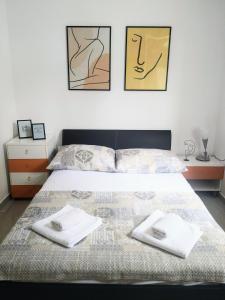 Postel nebo postele na pokoji v ubytování Apartment Luce