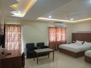 Hotel Rajwada palace客房内的一张或多张床位