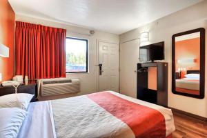 a hotel room with a bed and a window at Motel 6-Walnut Creek, CA in Walnut Creek