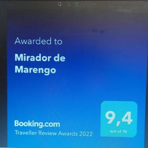 a blue phone screen with the words upgraded to mirator be marquez at Mirador de Marengo in Icod de los Vinos