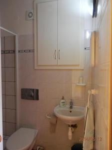 Koupelna v ubytování Penzion Apartmány Bečov + 33 fotografií