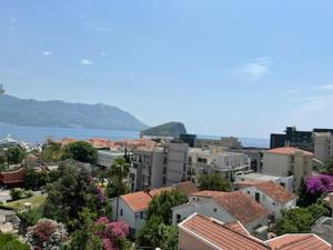 a view of a city with trees and buildings at The Old Town Terrace Apartments in Budva