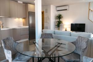 Kuchyňa alebo kuchynka v ubytovaní APARTAMENTOS VIRGEN DEL CARMEN + 18 fotografií