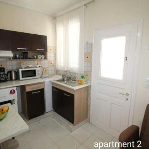 Η κουζίνα ή μικρή κουζίνα στο Messonghi- La Pazzeli