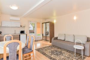 Kuchyň nebo kuchyňský kout v ubytování Apartamentų nuoma