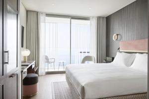 ON Residence - Small Luxury Hotels of the World客房内的一张或多张床位