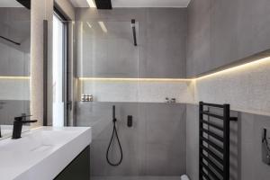 Ванна кімната в Sounio Panoramic Loft