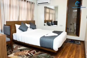 Postel nebo postele na pokoji v ubytování Hotel Dreams connect GRB