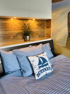 Posteľ alebo postele v izbe v ubytovaní Apartament Baltik Star + 21 fotografií