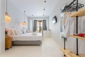 Krevet ili kreveti u jedinici u okviru objekta Hesperides Hotel Pefkochori