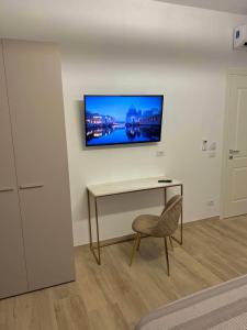 TV a/nebo společenská místnost v ubytování Rooms San Leonardo