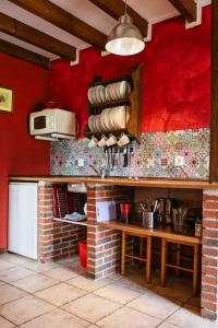 Cuina o zona de cuina de Apartamentos Rurales El Buxu