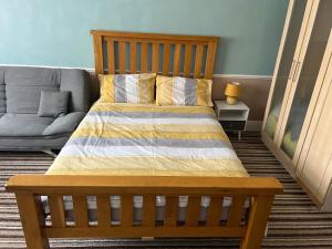 Łóżko lub łóżka w pokoju w obiekcie Hereward