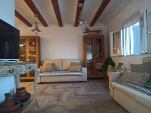 Posezení v ubytování BOIRA - Vivienda en urbanización a primera línea de playa
