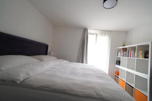 Postel nebo postele na pokoji v ubytování Ferienwohnung Grünegg