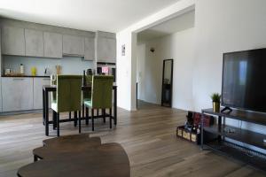 TV a/nebo společenská místnost v ubytování Ferienwohnung Grünegg