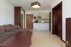 Kuchyňa alebo kuchynka v ubytovaní Jantar Apartamenty City Center