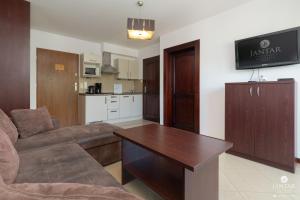 Kuchyňa alebo kuchynka v ubytovaní Jantar Apartamenty City Center