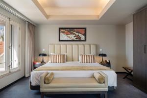 Llit o llits en una habitació de Hotel do Chiado