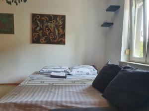 Posteľ alebo postele v izbe v ubytovaní Downtown Oasis Zagreb