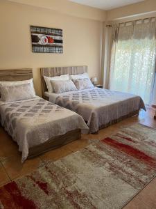 Postel nebo postele na pokoji v ubytování Hotel Zen