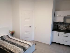 Postel nebo postele na pokoji v ubytování Werner Apartman