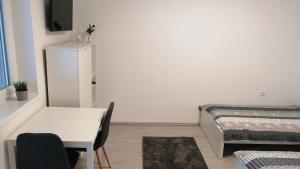 Postel nebo postele na pokoji v ubytování Werner Apartman