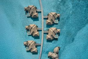 an overhead view of a group of buildings on the water at COMO Maalifushi - Partner Travels FREE for 7 Nights or More in Maalifushi
